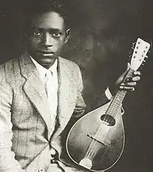 Portrait of "Papa" Charlie McCoy with his mandolin