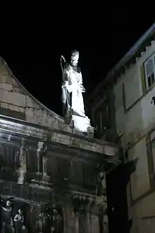 Statue of Saint Justus atop the church dedicated to him at Lyon, France.