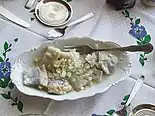 Śledzie – herring in oil with onions