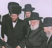 Rabbi Nosson Nochum Englard of Radzin-Yerushalayim with a group of Radziner Chassidim