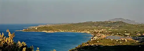 Bay of Alykes looking south showing the village of Alykes nearest (with the salt flats to the right) with Alikanas beyond.