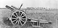 German 10.5-cm. light field howitzer with ammunition.