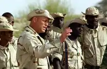 A 10th SFG (A) operator training Mali soldiers.