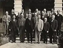 A group of men standing on steps