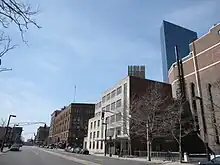 Four-lane street in winter, with few trees