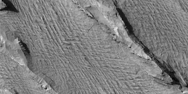 Yardangs, as seen by HiRISE under HiWish program  Location is near Gordii Dorsum in the Amazonis quadrangle. Note: this is an enlargement of previous image.