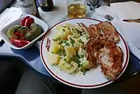 Image 27Baked potatoes with steak and cucumber salad (from Culture of Romania)