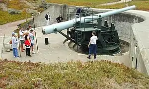 6-inch (152 mm) gun M1905 on disappearing carriage M1903, generally similar to several of Fort H. G. Wright's batteries