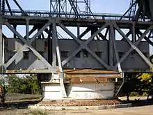 The steerable frames of Deep Space Communication Complex constructed from battleship gun turrets and railway bridge trusses.