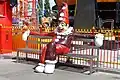 A sculptured clown inviting visitors to one of the attractions