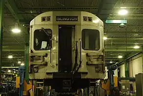 A T1 in the shops at Greenwood Yard with its rollsign set to Islington