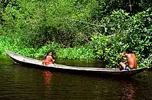 Image 30A Warao family traveling in their canoe in Venezuela (from Indigenous peoples of the Americas)