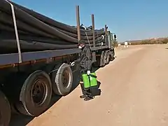 A man disinfecting a truck.