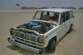 Abandoned car on Al Mafjar beach