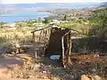 Abandoned pit latrine in the peri-urban area of Durban, South Africa