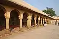 Arched arcade around the well