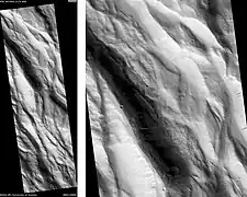 Acheron Fossae, as seen by HiRISE.  Scale bar is 1000 meters long.  Click on image to see dark slope streaks.