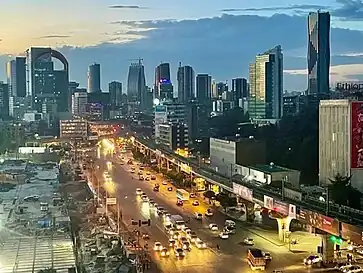 Skyline of Addis Ababa, Ethiopia, showing the city's numerous buildings and skyscrapers, including the Commercial Bank of Ethiopia Headquarters at the top-right.