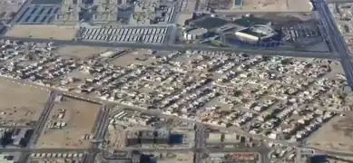 Aerial view of Jeryan Nejaima, looking west. The neighborhood is separated from Duhail at the top of the picture by Street 245, while the angled Jeryan Nejaima Street delineates it from Al Tarfa.