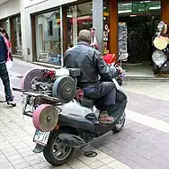 Scissors grinder with converted scooter in Tossa de Mar, 2009