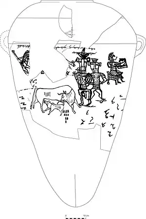 A reconstructed two-handled jar, with many missing fragments.  In the centre, two bull-headed figures look towards us.  There are other figures and the scene is hard to make out.