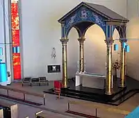 The Chancel with a tabernacle set into the wall