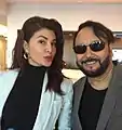 Koch is with Jacqueline Fernandez in 2017.