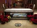 Holiday photograph at the altar for veneration of the remains of St. John Neumann