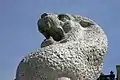 One of the two lion sculptures at the National Monument