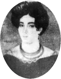 Miniature portrait of a young, dark-haired lady wearing a lace-trimmed dress and necklace