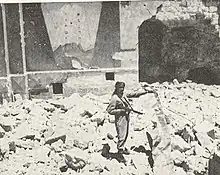 Arab Legion soldier standing in ruins of the most sacred Synagogue, the "Hurva", Old City.