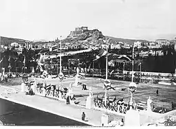 Entrance of participants to the stadium. The Acropolis is seen in the background.