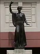 Goddess of Victory statue on Memorial Bridge, built c. 1931. In background is entrance to Hollywood Casino, c. 1993.