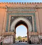 Decoration around the outer archway of the gate