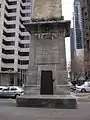 East side of Obelisk, showing maintenance access door as well as the sphinxes and other features