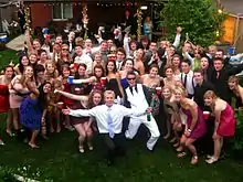 People posing at a backyard party in Canada