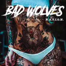 The cover consists of a tattooed woman's body wearing a blue top and panties. The band's name and album title are placed on top of the cover, colored in white.