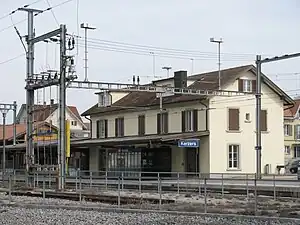 Two-story building with gabled roof