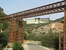 Bailey bridge over the Wadi el Kuf, Libya, with bridge sections used to construct the supports (2007)