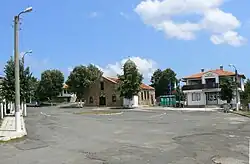 In front of the church and municipal hall