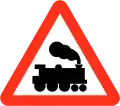 Railway level crossing without gate or barrier