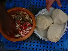 Ghanaian Banku Ne Mako (banku and pepper-tomato sauce)