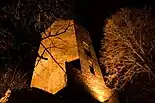 Medieval castle tower at night