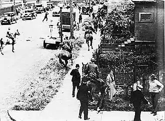 Image 9Mounted police chase demonstrators through Vancouver's East End during the Battle of Ballantyne Pier in 1935.