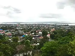 Baubau as seen from the Buton Palace Fortress, with the island of Muna in the distance.