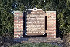 Historical marker for the Bay View Massacre