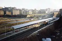 The new truncated Bradford Forster Square station just after opening with the old station in the background. The old station was closer to the city centre