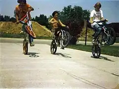 Children cycling during summer