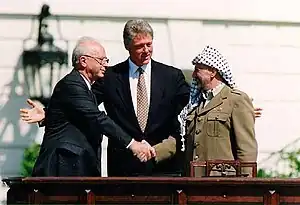 Image 19Yitzhak Rabin, Bill Clinton, and Yasser Arafat during the Oslo Accords signing ceremony at the White House on 13 September 1993 (from History of Israel)
