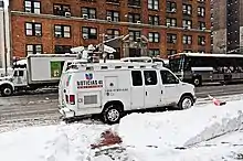 A white news van with the Univision logo and "Noticias 41 Univision" on the side